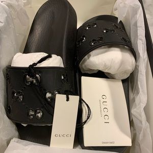 Gucci black GG rubber slides. Women’s sz 7